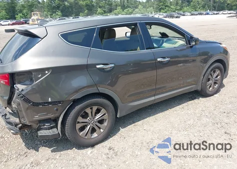 2014 Hyundai Santa Fe Sport 2.4L z USA, uszkodzony, nr VIN 5XYZT3LB8EG211915